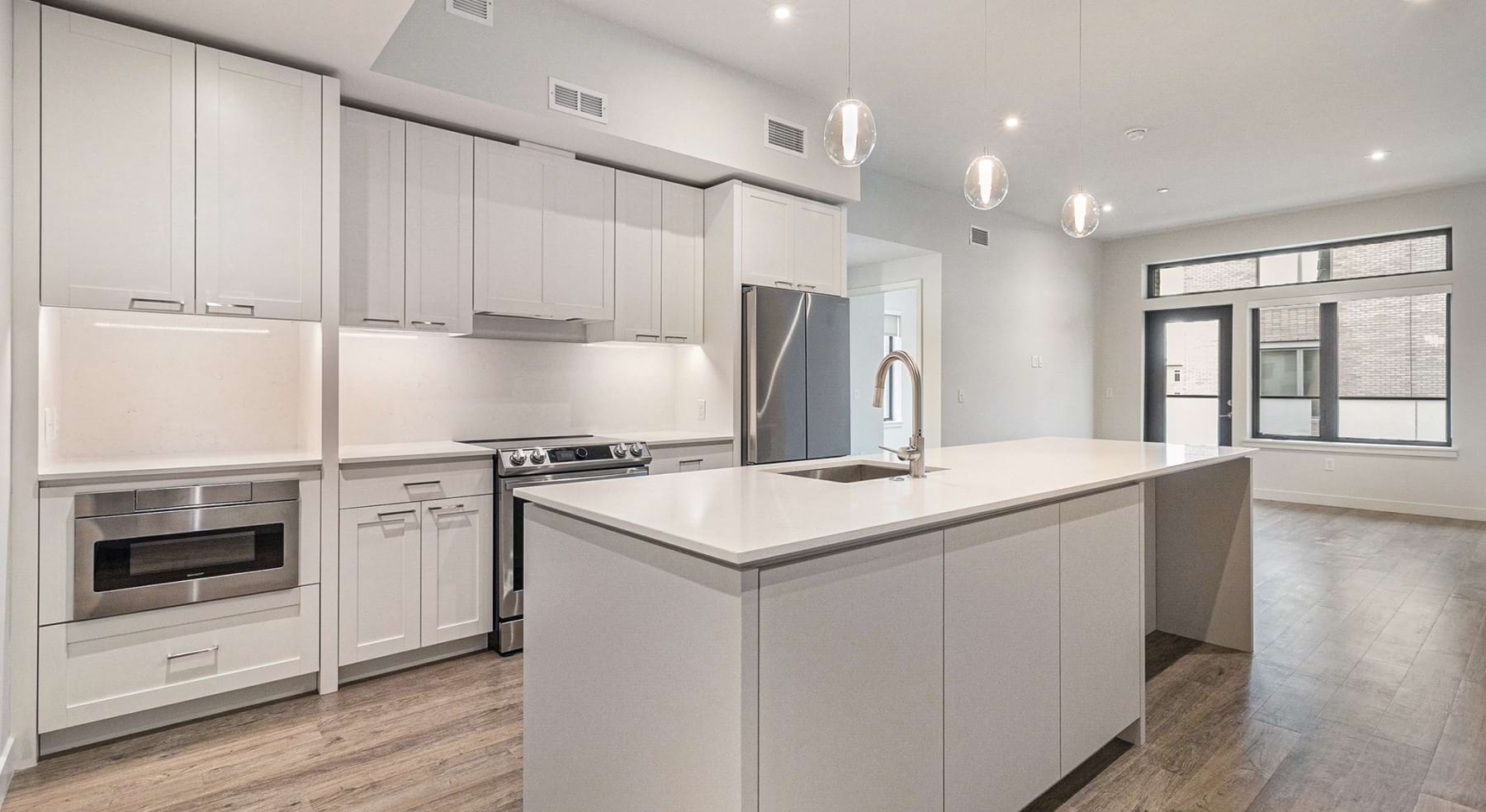 Well-lit kitchen with ample counter space