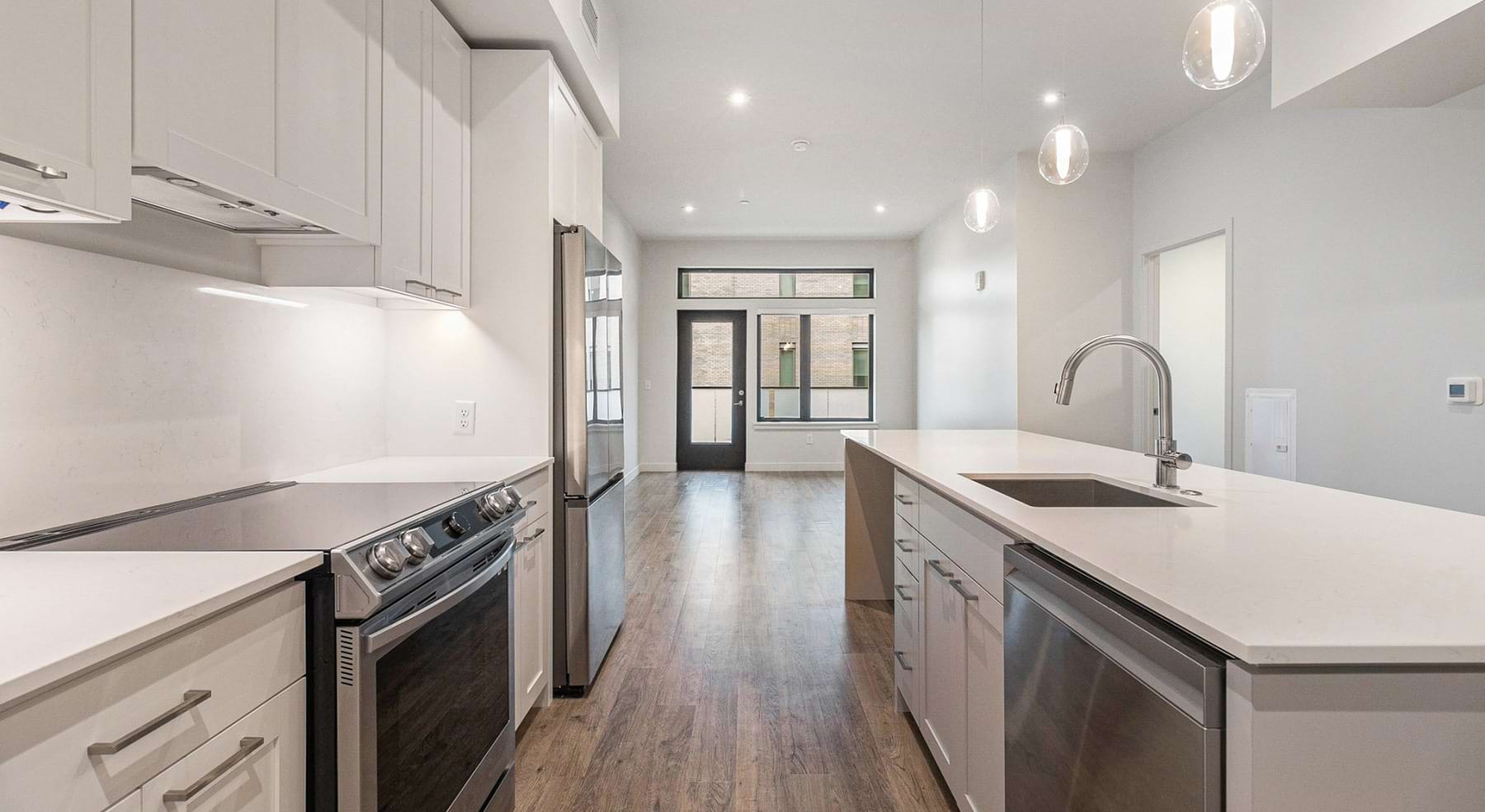 Well-lit kitchen with ample counter space