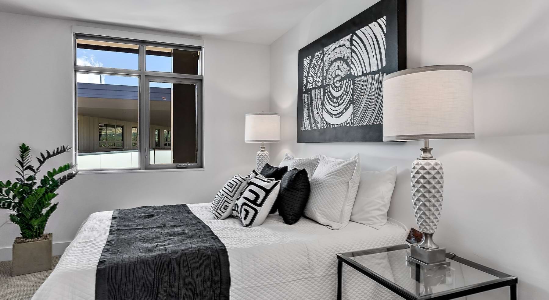 Bedroom with natural lighting and high ceilings
