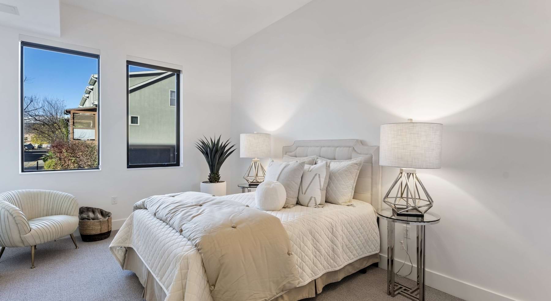 Bedroom with natural lighting and high ceilings