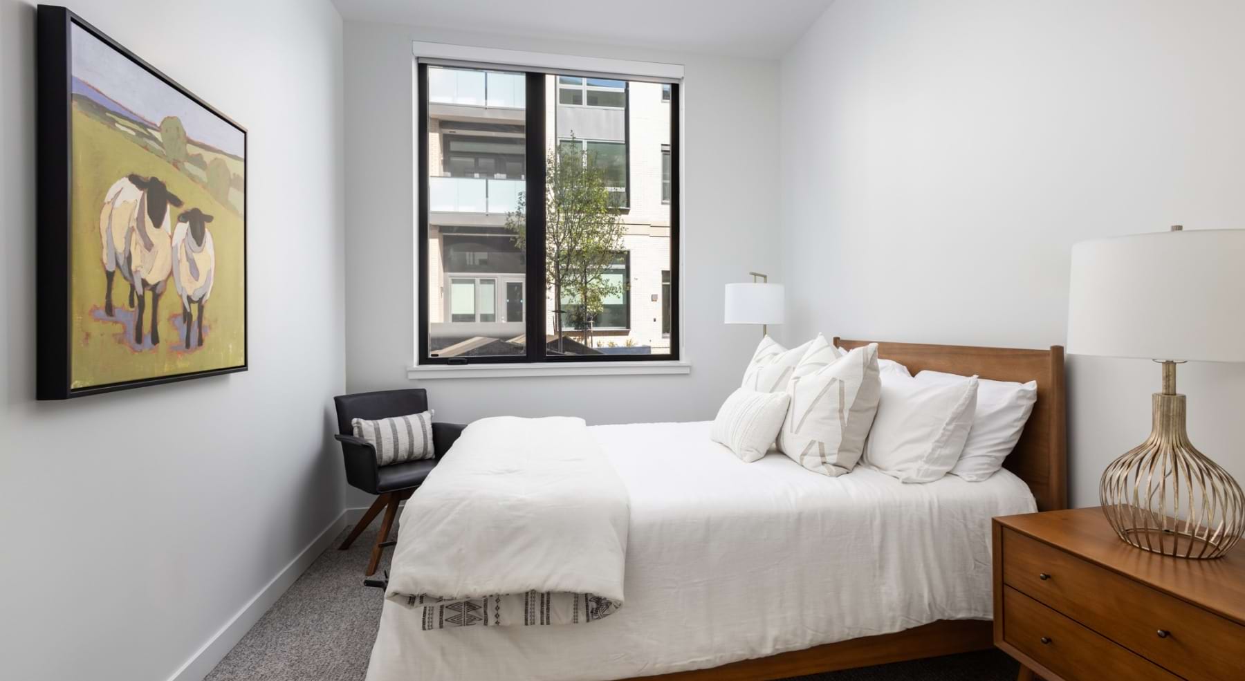 Bedroom with natural lighting and high ceilings