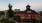 The Boulder Depot near our apartments for rent in Boulder, CO, featuring outdoor seating and a park with trees.