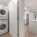 stacked washer/dryer units in laundry closet
